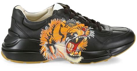 gucci sneakers tiger back|Gucci rhyton leather sneakers.